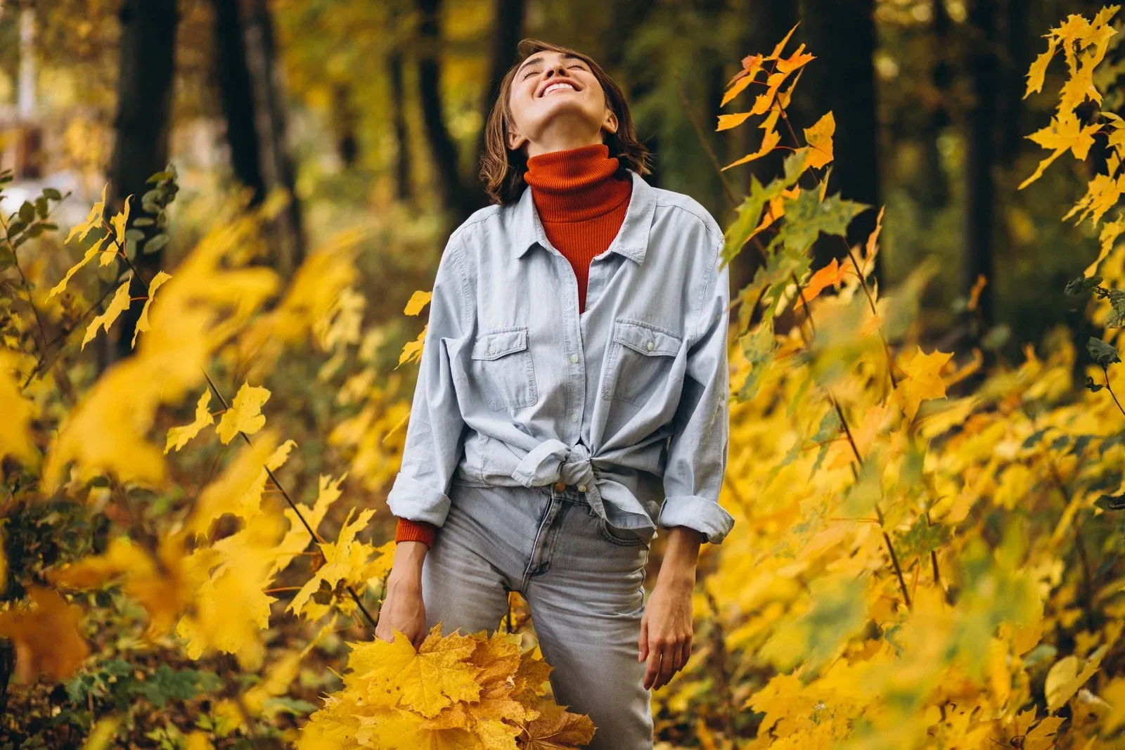 Woman walking outdoors in a sunlit park